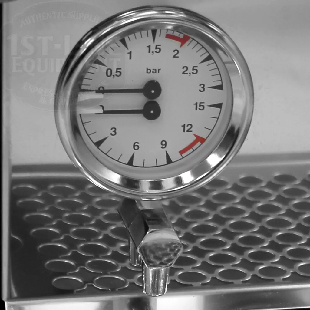 A close-up of a pressure gauge on the DISCONTINUED Bezzera BZ07 PM PID Espresso Machine shows needles at 1 and 11 bar, with a circular dial numbered 0–15 and a reflective metal casing. © 2025 1st-line.com