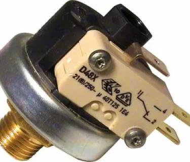 A close-up of the Mater XP110 Pressurstat with 1/4 threading, showing its metal threaded base, plastic housing, exposed terminals, and a label with technical specs and wiring diagram. © 2025 1st-line.com