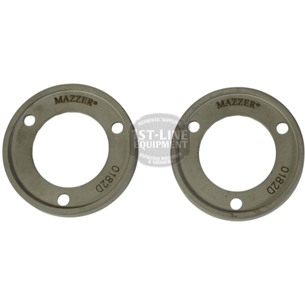 A set of two Mazzer FMA00182D/QQQ 1-phase 58mm flat grinding burrs, each with three holes and a hollow center, are shown side by side on a white background. © 2025 1st-line.com