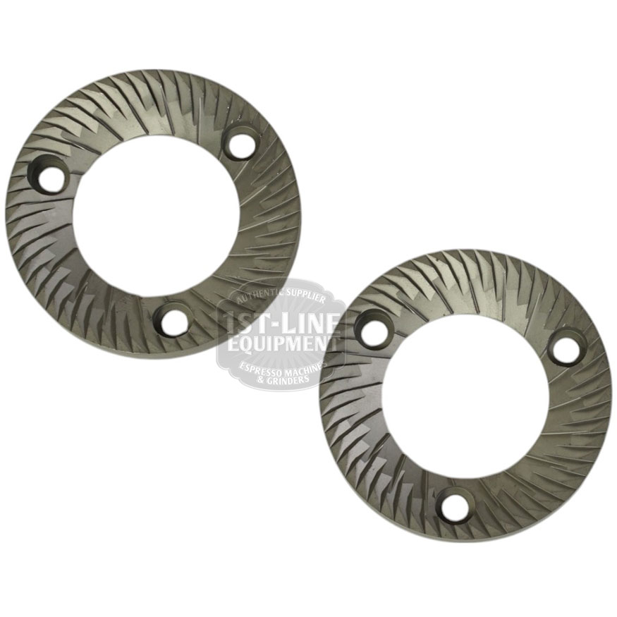 Mazzer FMA00182D/QQQ 1-phase 58mm Flat Grinding Burrs (set of 2) with angled grooves and three round holes each are shown against a white background. Suitable as grinding components for coffee grinders. © 2025 1st-line.com