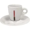 The Kimbo Espresso Cup & Saucer - 3 fl oz features a handle and bold red vertical KIMBO text on its cup, elegantly paired with a matching white saucer. © 2025 1st-line.com
