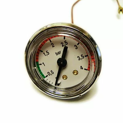 The VBM MANMDOE40025 Boiler Pressure Gauge shows a needle at 2.5 bar on a round dial with green, white, and red zones for safe, normal, and warning levels. It has a metallic rim and an attached tube. © 2025 1st-line.com