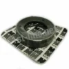 A round metal car part sits in clear plastic packaging with a white and black background featuring MA logos, resembling the packaging of Mazzer OEM FMA00151B 1-Phase 83mm Flat Grinding Burrs (set of 2) for Mazzer machines. © 2025 1st-line.com