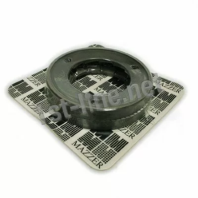 A set of Mazzer OEM FMA00151A/QQQ 1-Phase 83mm Flat Grinding Burrs sits on top of a square paper with the Mazzer logo and pattern, viewed from an angle. © 2025 1st-line.com