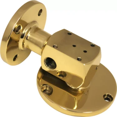 The Elektra 00604019 Brass Grouphead / Delivery Unit features a shiny brass swivel mount with two round plates—one flat, one angled—joined by a rectangular connector with threaded holes and a central opening. © 2025 1st-line.com