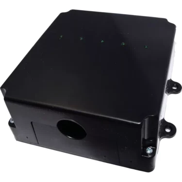 The Elektra 03661034 Control Box is black and rectangular with rounded edges, four top indicator lights, side mounting flanges, and a circular side opening. Compatible with 115V Sixties 1 Group only. © 2025 1st-line.com