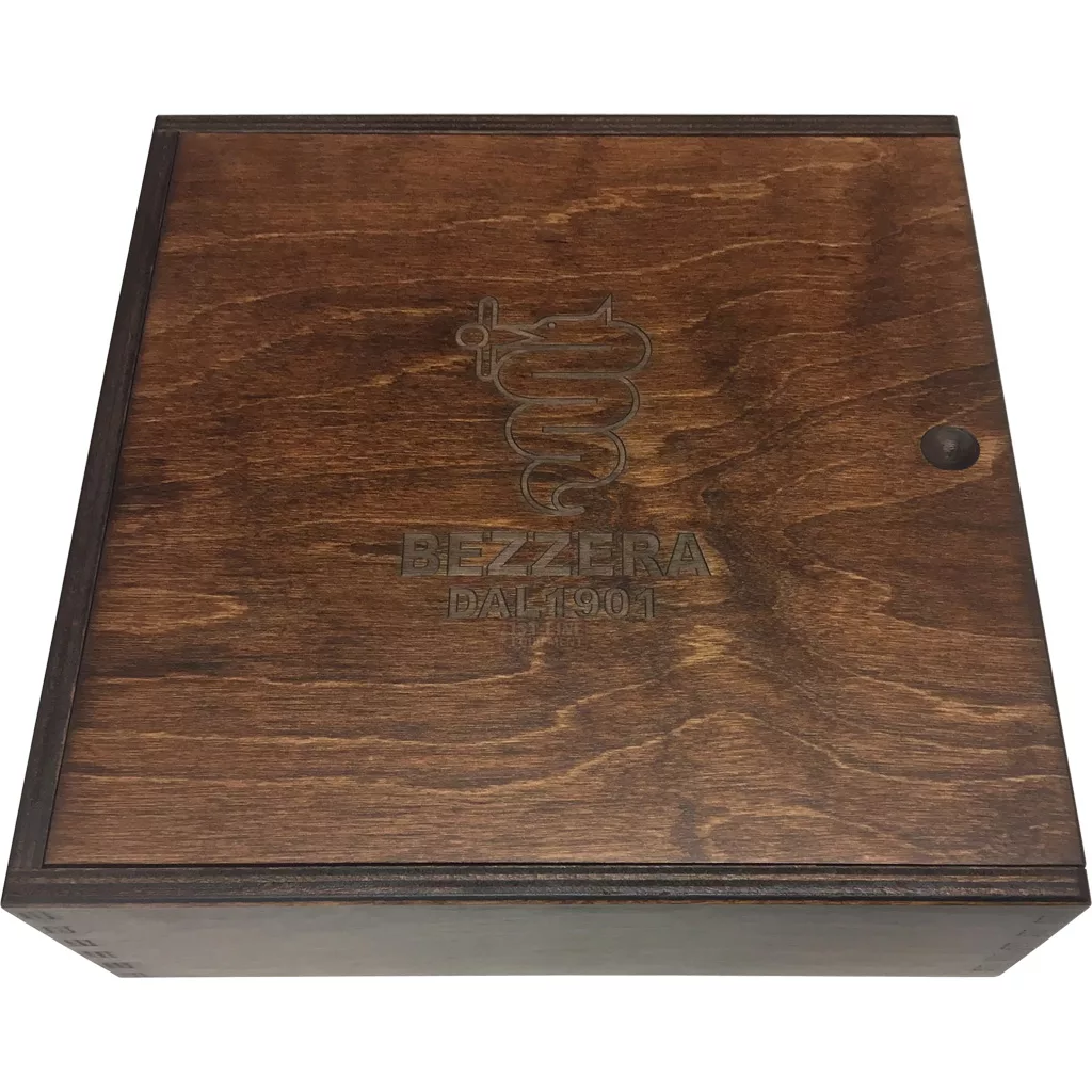 The Bezzera 5963152.01 Unica Wood Portafilter & Knob Kit includes a smooth, square dark wood box with a metal knob and the Bezzera Dal 1901 logo—ideal for storing your portafilter accessories. © 2025 1st-line.com
