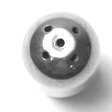 Close-up, top-down view of a WL2032 4 FAXTON ORANGE MOMENTARY PUSH-BUTTON with a metallic, round design and five holes, encircled by a white ceramic or plastic edge, against a white background. © 2025 1st-line.com